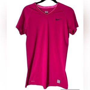 Nike pro sport wear shirt in the color hot pink size M